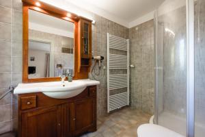 a bathroom with a sink and a shower at Gästehaus Friedlich in Schönau am Königssee +57 photos