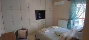 Voodi või voodid majutusasutuse Elysian Dreams at Patras toas