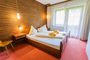 Postel nebo postele na pokoji v ubytování Huberhof 8 by Alpenidyll Apartments