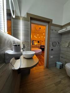 a bathroom with a sink and a tub at Villa Immacolata in Casalabate +28 photos