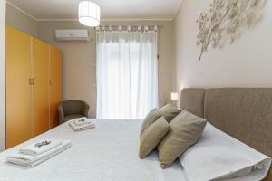 Posteľ alebo postele v izbe v ubytovaní Terrace under Taormina just a few minutes walk to the free beach and downtown!
