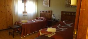 Postel nebo postele na pokoji v ubytování CTR Casona Santa Coloma