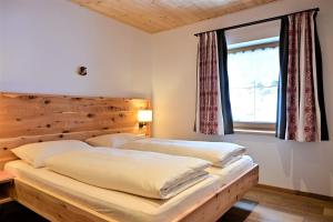 Postel nebo postele na pokoji v ubytování Apartment Wetterstein