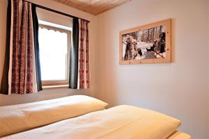 Postel nebo postele na pokoji v ubytování Apartment Wetterstein + 9 fotografií