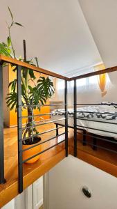 Ένα ή περισσότερα κρεβάτια σε δωμάτιο στο Miru Loft Prague