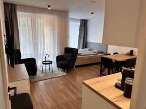 Postel nebo postele na pokoji v ubytování SORRY-HORY Apartmán Dolní Morava