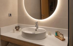 a bathroom with a sink and a mirror at La Sort Boutique Hotel in Moraira