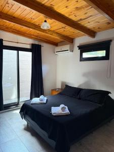 En eller flere senge i et værelse på HOSPES