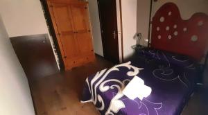 Postel nebo postele na pokoji v ubytování CTR Casona Santa Coloma