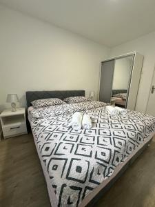 Postel nebo postele na pokoji v ubytování Apartment Dario