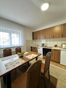 Kuchyň nebo kuchyňský kout v ubytování Apartment Dario