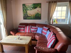 Posezení v ubytování Ferienhaus Hooksiel mit Sauna und Kamin
