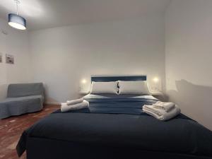 Postel nebo postele na pokoji v ubytování Flo Guest House