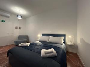 Postel nebo postele na pokoji v ubytování Flo Guest House