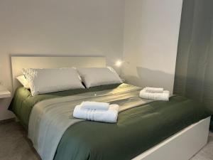 Postel nebo postele na pokoji v ubytování Flo Guest House
