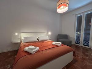 Postel nebo postele na pokoji v ubytování Flo Guest House