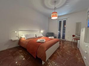 Postel nebo postele na pokoji v ubytování Flo Guest House