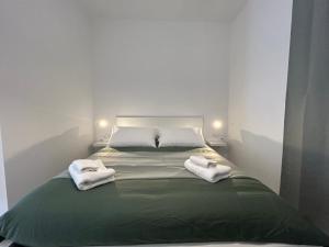 Postel nebo postele na pokoji v ubytování Flo Guest House