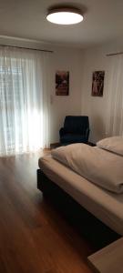 Posteľ alebo postele v izbe v ubytovaní Marlingsuites - Vinea - Wieser Josef - Marling