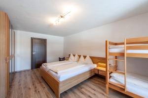 Posteľ alebo postele v izbe v ubytovaní Appartement 103
