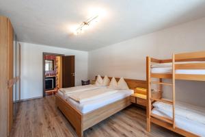 Posteľ alebo postele v izbe v ubytovaní Appartement 103