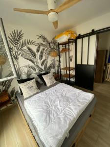 Ένα ή περισσότερα κρεβάτια σε δωμάτιο στο Beach Loft 4 pers