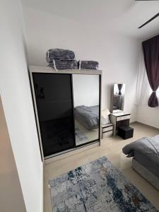 Postel nebo postele na pokoji v ubytování LBS Skylake Residence - TheMalaikaHomestay