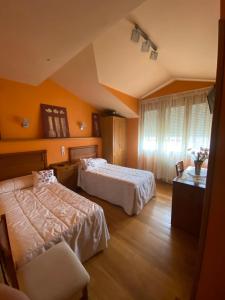 Postel nebo postele na pokoji v ubytování Hostal Monica + 18 fotografií