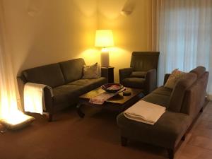 Ein Sitzbereich in der Unterkunft Villa Sorgenfrei - a65549