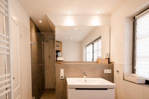 Koupelna v ubytování Ferienhaus Meeresschatz + 11 fotografií