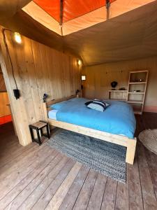 Letto o letti in una camera di Back to Basic