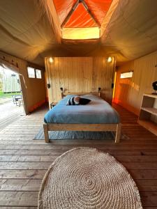 Letto o letti in una camera di Back to Basic
