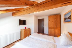 Posteľ alebo postele v izbe v ubytovaní Appartement 204 + 1 fotografia