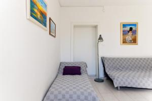 Posteľ alebo postele v izbe v ubytovaní Haus Perkovic