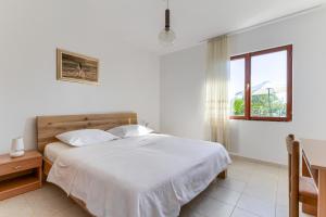 Posteľ alebo postele v izbe v ubytovaní Haus Perkovic