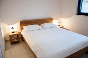 Posteľ alebo postele v izbe v ubytovaní Haus Cvita