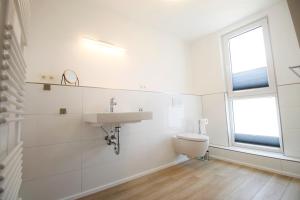 Koupelna v ubytování Haus Barbara - Schwimmbad und Sauna im Haus-Whg 12
