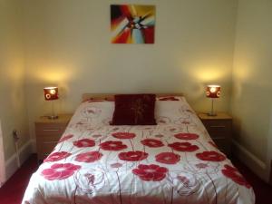 Postel nebo postele na pokoji v ubytování Grant Arms Hotel