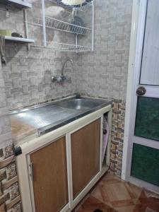 Kuchyň nebo kuchyňský kout v ubytování sand studio