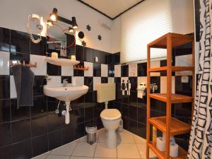 a bathroom with a sink and a toilet at Wohnung Steinbach nahe Skihalle Oberhof in Kurort Steinbach-Hallenberg +19 photos
