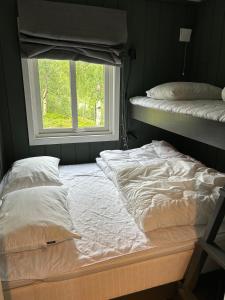 Postel nebo postele na pokoji v ubytování Cabin in Valldalen, Røldal