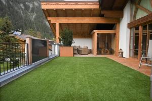 Vonkajšia záhrada v ubytovaní Apartment Zugspitze