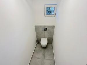 Ένα μπάνιο στο Krásny byt - perfektný apartmán v Novom meste +2 φωτογραφίες