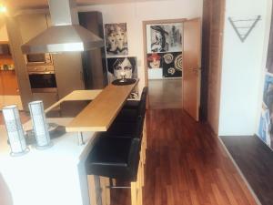 a kitchen with a island with a counter top at Ferienwohnung Marberth in Hildesheim