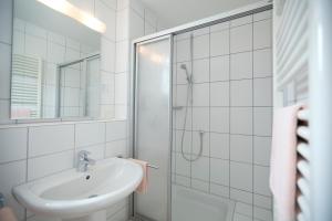 Koupelna v ubytování Hotel Möhringer Hof + 37 fotografií