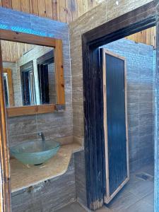 a bathroom with a bowl sink and a mirror at Mangrove Camp in Sharm El Sheikh +75 photos