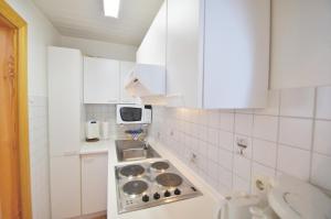 Η κουζίνα ή μικρή κουζίνα στο Ferienbungalow 2