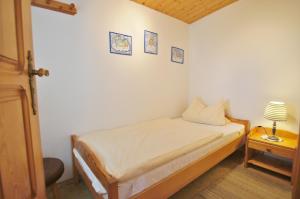 Ένα ή περισσότερα κρεβάτια σε δωμάτιο στο Ferienbungalow 2