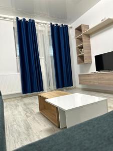 TV a/nebo společenská místnost v ubytování Studio Demy