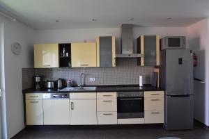 Η κουζίνα ή μικρή κουζίνα στο Moin Ferienwohnung +15 φωτογραφίες